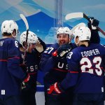 Noah Cates #27 of Team United States celebrates a goal with teammates in the second period of the game against Team China during the Men's Ice Hockey preliminary round at the 2022 Winter Games in the National Indoor Stadium, Feb. 10, 2022, in Beijing, China.