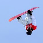 Ayumu Hirano in mid-air doing a trick