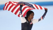 Erin Jackson of Team United States celebrates after winning gold at the 2022 Winter Olympic Games for the Women's 500m, at National Speed Skating Oval, Feb. 13, 2022, in Beijing.