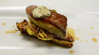 HERMOSA BEACH, CA - JUNE 29: Foie gras dishes are prepared at Hot's Kitchen during a "Farewell Fois Gras" event on June 29, 2012 in Hermosa Beach, California. It was the last weekend foie gras could be served in California restaurants as a ban enacted nearly eight years prior on foie gras, fattened duck or goose liver, took effect on July 1. (Photo by Kevork Djansezian/Getty Images)