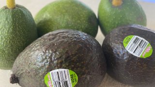 Avocados are displayed on a table, Feb. 13, 2022.