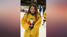 Scripps Ranch resident Keely Moy, who is competing for Team Switzerland at the 2022 Winter Olympics in Beijing, is shown in an undated photo from when she played hockey as a child in San Diego.