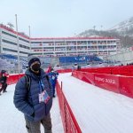 NBC 7 Anchor Steven Luke stands at the bottom of a ski run in the mountains outside of Beijing at the Winter Olympics, Feb. 13, 2022.