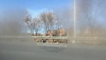 Steam fogs up a window on a bullet train at the Winter Olympics in Beijing, Feb. 5, 2022.