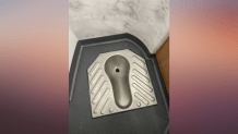 A photo of a "squat toilet" on a bullet train in Beijing, Feb. 5, 2022.