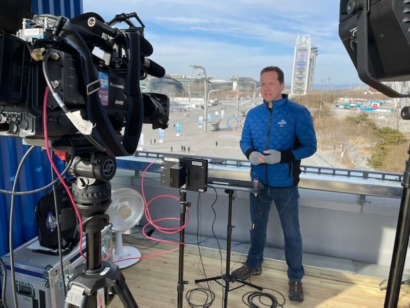 NBC 7 anchor Steven Luke conducts a recorded "standup" at the Winter Olympics in Beijing, Feb. 6, 2022.