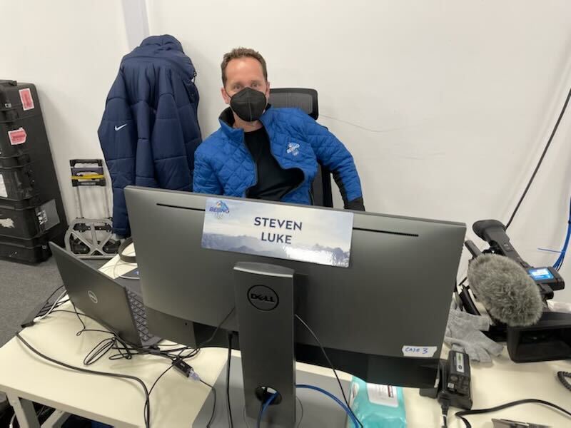 NBC 7 anchor Steven Luke sits at his desk in Beijing during the Winter Olympics, Jan. 31, 2022.