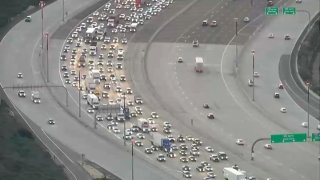 Several vehicles stuck in traffic on I-5 north near Carmel Valley on Friday, Feb. 11, 2022.