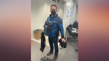 NBC 7 anchor Steven Luke stops for a photo while loading up his camera and liveshot gear at the Winter Olympics in Beijing, Feb. 9, 2022.