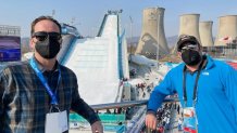 NBC 7 anchor Steven Luke (left) and NBC 7 Media Manager Jason Guinter (right) pose for a photo at the Big Air Shougang Olympic venue in Beijing, Feb. 9, 2022.