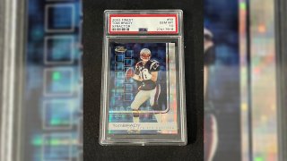 A rare 2002 Tom Brady X-Fractor card from his days as a New England Patriots quarterback sold for $118,000 from Saco River Auction. The auction ended just hours before Brady formally announced his retirement from the NFL.