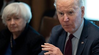 US President Joe Biden, with Treasury Secretary Janet Yellen, speaks during a meeting with his cabinet at the White House in Washington, DC, on March 3, 2022.