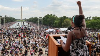 Yolanda Renee King, granddaughter of the Rev. Martin Luther King Jr., raises her fist as she speaks during the March on Washington, Friday Aug. 28, 2020, in Washington, on the 57th anniversary of the Rev. Martin Luther King Jr.'s "I Have A Dream" speech.