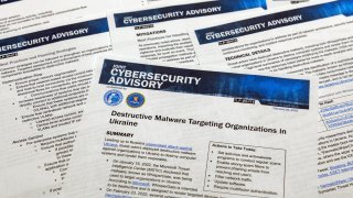 A Joint Cybersecurity Advisory published by the Cybersecurity & Infrastructure Security Agency about destructive malware that is targeting organizations in Ukraine is photographed Monday, Feb. 28, 2022.