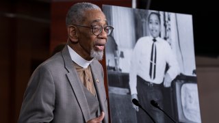 FILE - Rep. Bobby Rush, D-Ill., speaks during a news conference about the "Emmett Till Anti-Lynching Act" on Capitol Hill in Washington, on Feb. 26, 2020. Emmett Till, pictured at right, was a 14-year-old African-American who was lynched in Mississippi in 1955, after being accused of offending a white woman in her family's grocery store. Legislation that would make lynching a federal hate crime in the U.S. is expected to be signed into law next week by President Joe Biden.