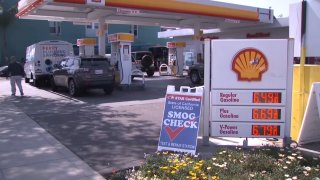 Cars fill up at a Shell gas station in San Diego County in this undated photo.