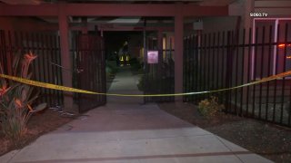 Caution tape marks the scene of an investigation following a fire at an apartment in El Cajon on Tuesday, March 8, 2022.