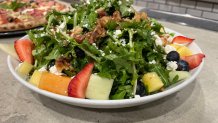 As part of Taste of Third, Farmer's Table will offer this fresh salad topped with walnuts and fruit as a sample on Thursday, March 31, 2022.