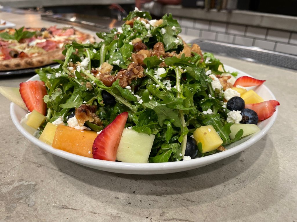As part of Taste of Third, Farmer's Table will offer this fresh salad topped with walnuts and fruit as a sample on Thursday, March 31, 2022.