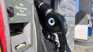 A gasoline pump at a gas station in San Diego, taken on Saturday, March 26, 2022.