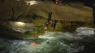 San Diego lifeguards rescue a man and woman from rugged waters near Sunset Cliffs on Wednesday, March 2, 2022.