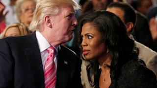 Republican presidential nominee Donald Trump and Omarosa Manigault (R) attend a church service, in Detroit, Michigan, U.S., September 3 2016.