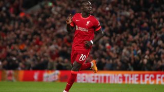 Sadio Mane of Liverpool celebrates scoring his side's third goal during the Premier League match between Liverpool and Manchester United