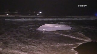 A suspected panga boat washed onshore in Ocean Beach on April 10, 2022