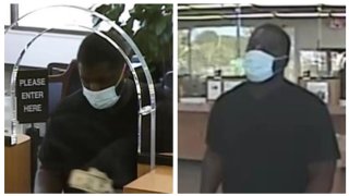 A man in a blue surgical mask is seen at the counter of an Escondido bank on Tuesday, April 19, 2022. San Diego FBI say they are searching for this individual, who allegedly robbed the bank.