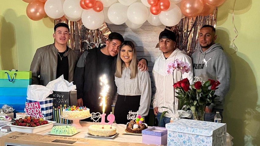 Jesus Saldaña is the second from the left hugging his girlfriend Amairani Rodríguez.