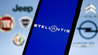 File - Stellantis logo displayed on a phone screen is seen with some of the company brands logos displayed in the background in this illustration photo taken in Krakow, Poland on Dec. 7, 2021.