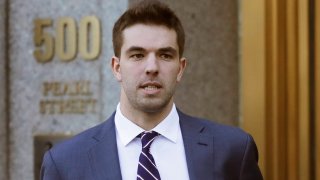 FILE - In this March 6, 2018 file photo, Billy McFarland, the promoter of the failed Fyre Festival in the Bahamas, leaves federal court after pleading guilty to wire fraud charges in New York. More than three years after the highly publicized Fyre Festival famously fizzled out in the Bahamas, merchandise and other "minor assets" are available for purchase, courtesy the U.S. Marshals Service from Texas-based Gaston & Sheehan Auctioneers.