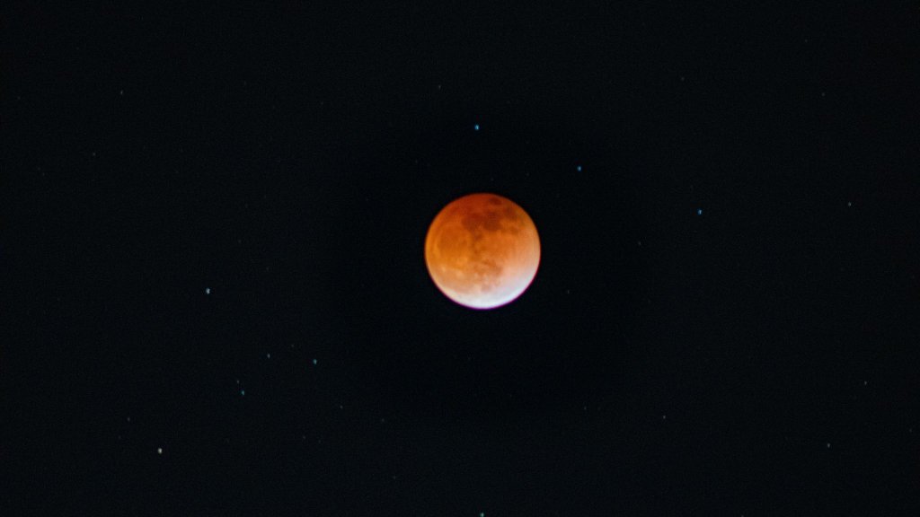A red blood moon during a lunar eclipse in San Diego