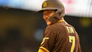 ATLANTA, GA MAY 13: San Diego second baseman Ha-Seong Kim (7) reacts to the Braves dugout during the MLB game between the San Diego Padres and the Atlanta Braves on May 13th, 2022 at Truist Park in Atlanta, GA. (Photo by Rich von Biberstein/Icon Sportswire via Getty Images)