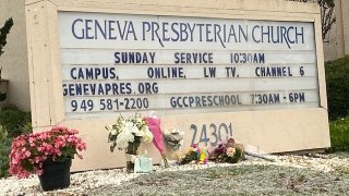 Flowers are left outside a Laguna Woods church.