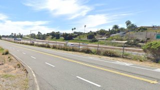 A Google Maps image of the intersection of Piraeus Street and Normandy Road, where a man was struck and killed while picking a flower along the side of the road, authorities said.