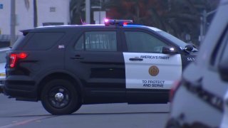 A San Diego Police Department cruiser responds to the scene of a deadly shooting near Normal Heights on Monday, May 16, 2022.