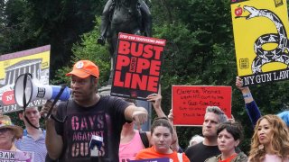 Jay Walker, third from left, co-founder of Gays Against Guns