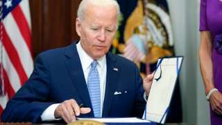 President Joe Biden signs into law S. 2938, the Bipartisan Safer Communities Act gun safety bill