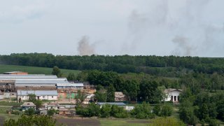 Smoke rises during shelling near Shestakove, east of Kharkiv, Ukraine, Wednesday, May 25, 2022.