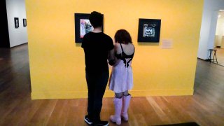 Visitors look at paintings by artist Jean-Michel Basquiat at the Orlando Museum of Art, Wednesday, June 1, 2022, in Orlando, Fla. On Friday, June 24, 2022, the FBI raided the art museum and seized more than two dozen paintings attributed to Basquiat following questions about their authenticity.