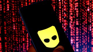 Grindr logo on a phone