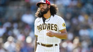 SAN DIEGO, CA – JULY 4: Sean Manaea #55 of the San Diego Padres holds the ball after loading the bases during the first inning of a baseball game against the Seattle Mariners July 4, 2022 at Petco Park in San Diego, California. (Photo by Denis Poroy/Getty Images)