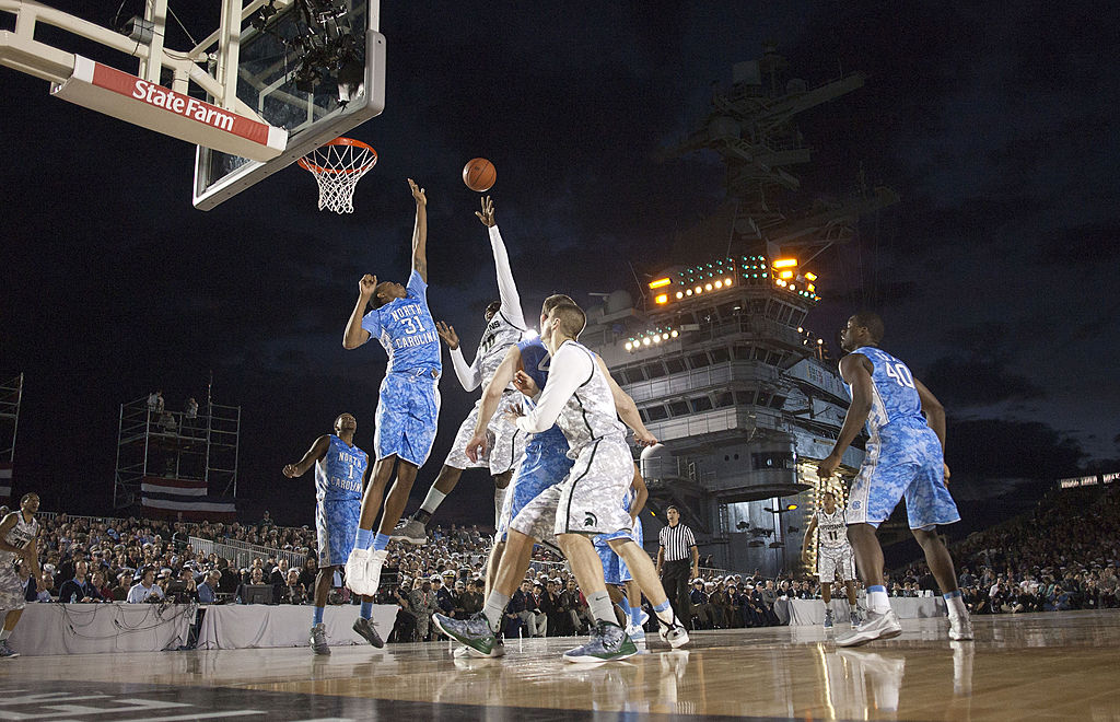 North Carolina's John Henson (31) tries to block a shot by Michigan State's Draymond Green (10) in the first half in the Tar Heels' 67-55 victory on Friday, November 11, 2011, aboard the USS Carl Vinson in San Diego, California. (Robert Willett/Raleigh News & Observer/Tribune News Service via Getty Images)