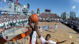 SAN DIEGO, CA - NOVEMBER 11: Winston Shepard #13 of the San Diego State Aztecs jumps for a rebound during the game against the Syracuse Orange on the USS Midway on November 11, 2012 in San Diego, California. Syracuse won 62-49. (Photo by Harry How/Getty Images)