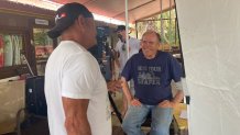 Documentary writer and Poway High School graduate Jim Kempton is seen chatting on the set of Big Wave Guardians in this undated image. (Courtesy: Daphne Bercilla)