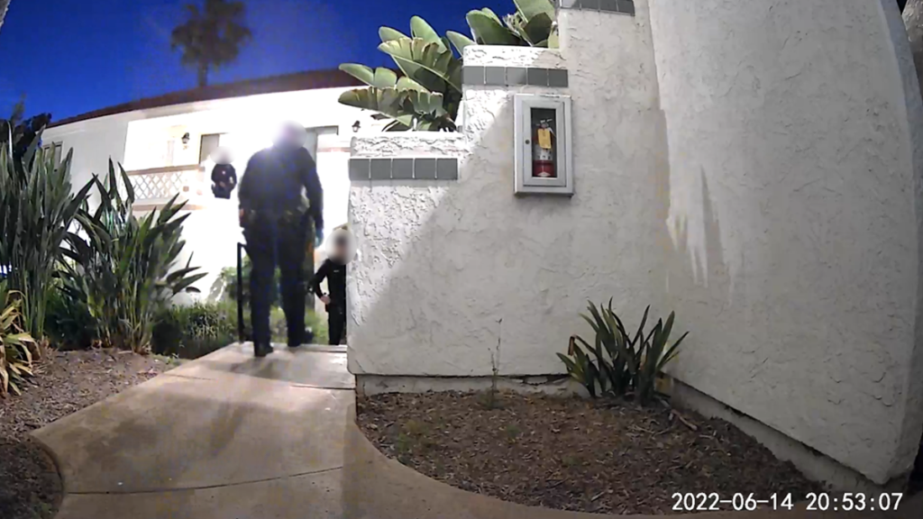 A neighbor's security camera captured police responding to the condo nearly two hours after their first calls to 911.