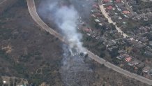 SkyRanger 7 is at the scene of a fire near Cowles Mountain in the San Carlos neighborhood on July 22, 2022.