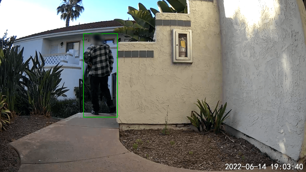 A neighbor's security camera captured the suspect outside the victim's condo on June 14.