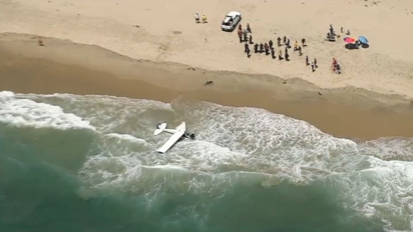 A small plane crashed into the water early Friday afternoon off Huntington Beach.